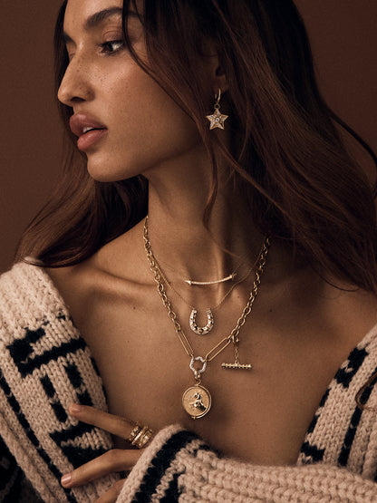 Supernova Star Drop Huggie Earrings
