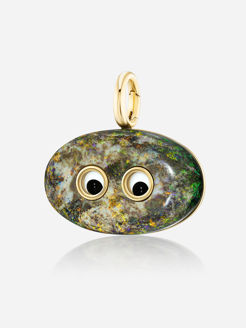 Close-up of Lil’ Buddies Pendant Barry, 38.31ct opal with vibrant fire, set in 18k yellow gold with crystal and onyx googly-eyes.