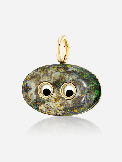 Close-up of Lil’ Buddies Pendant Barry, 38.31ct opal with vibrant fire, set in 18k yellow gold with crystal and onyx googly-eyes.