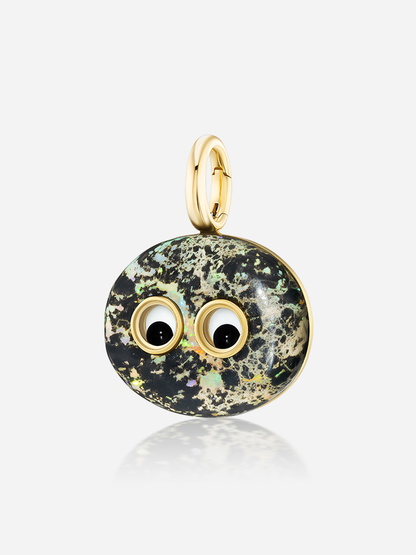 Angled close-up of the 24.85ct opal set in 18k yellow gold with white and black onyx googly-eye detail accents, Harwell Godfrey Lil’ Buddies “Freddie” pendant.